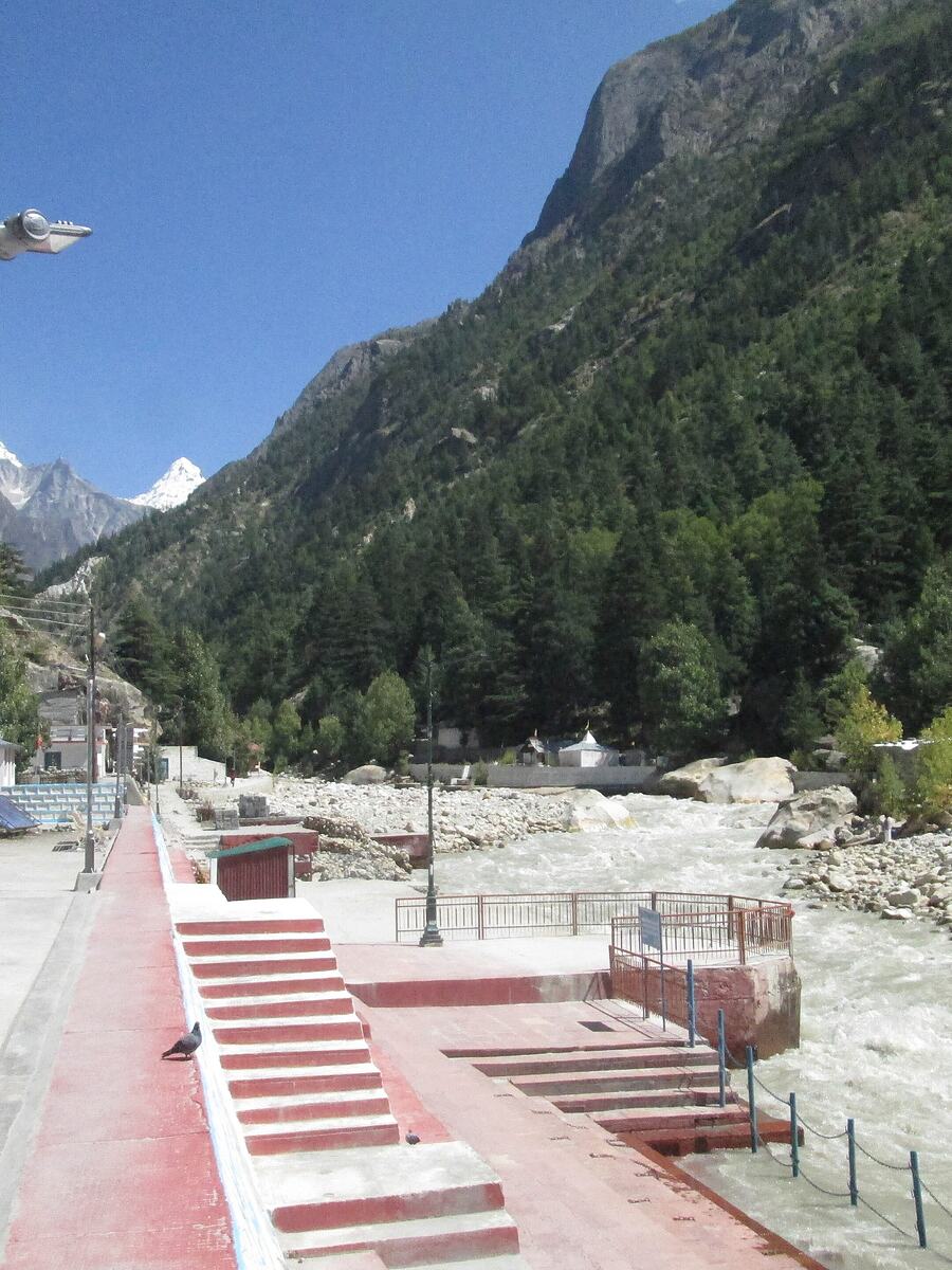The Bhagirathi running past Gangotri below snow peaks